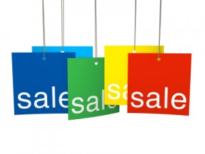 Multicolor hanging sale tags isolated on white with clipping path